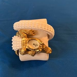 Wintex Milano white alligator wrap watch with gold accents and crystal eyes.